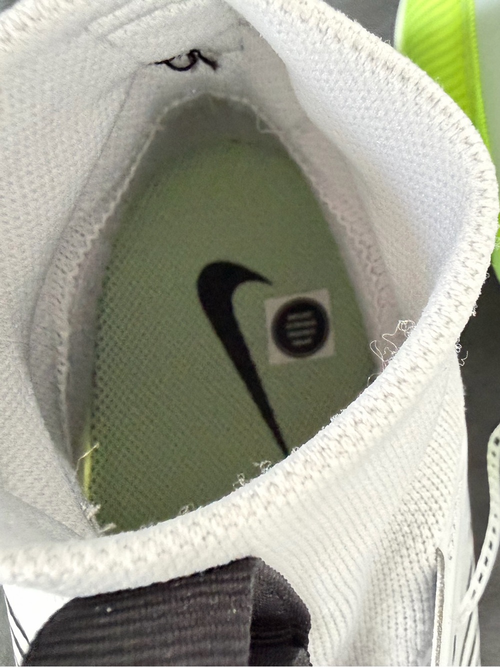 Nike Men’s White Athletic Cleats with Neon Yellow Accents - Picture 8 of 10